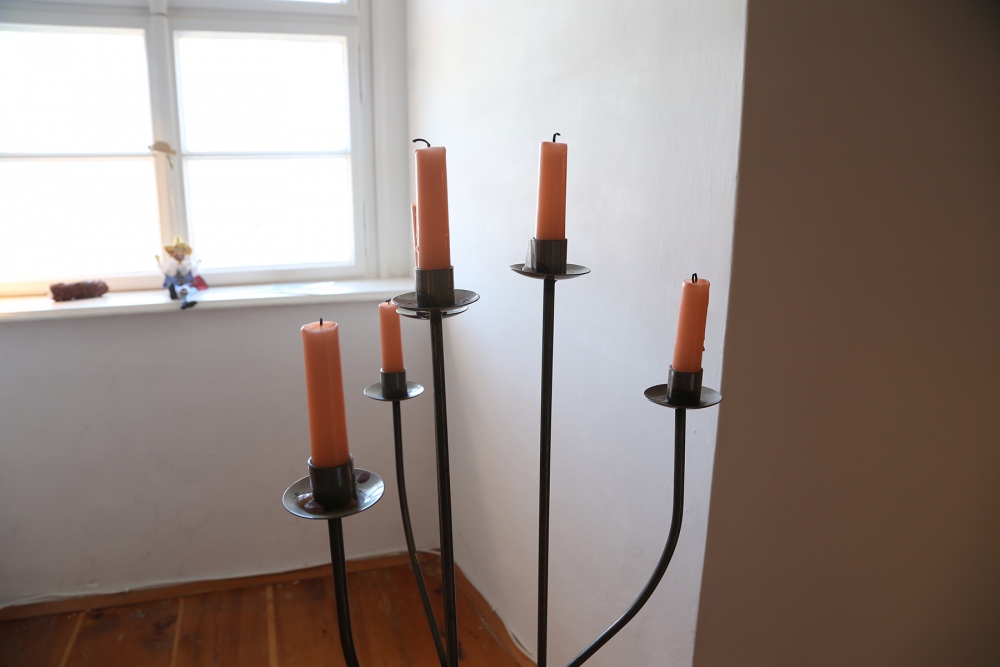 object: human size wrought iron candle stand